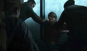 A screenshot from the game The Last of Us Part II Remastered on PC, showing Joel being held down by multiple people.