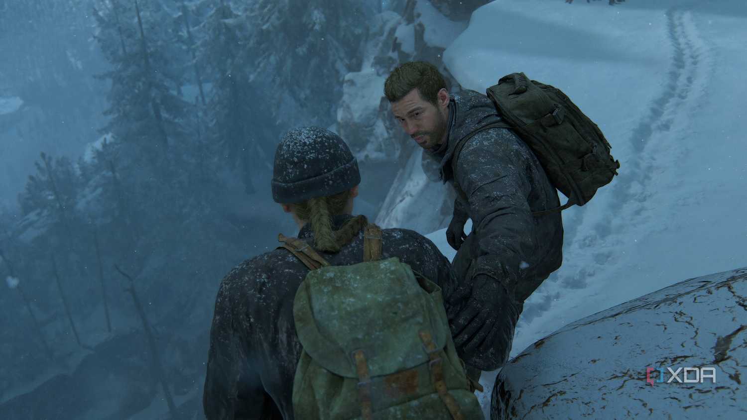 the last of us part 2 abby and owen standing in snow