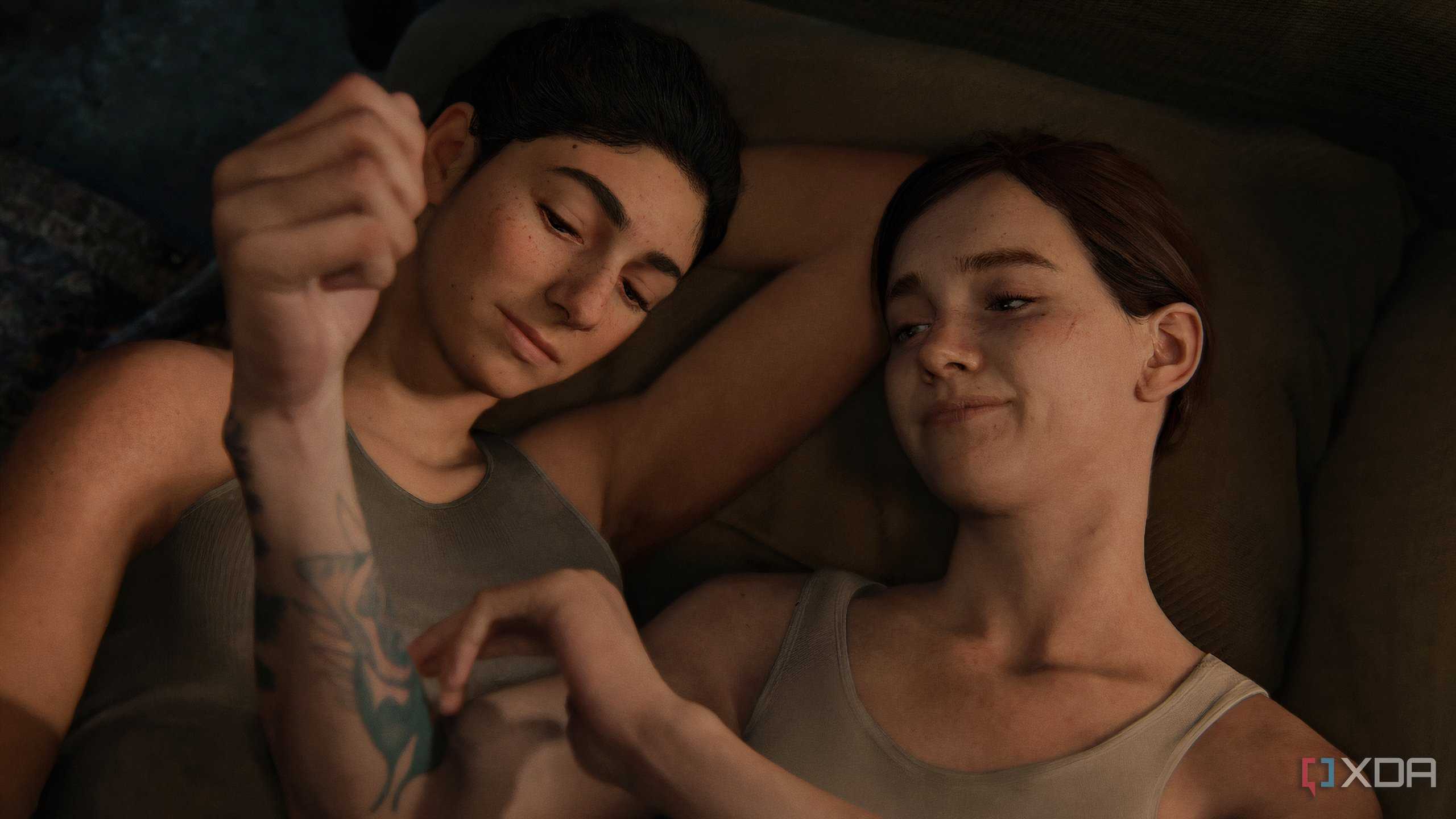 A screenshot from the game The Last of Us Part II Remastered on PC, showing Dina and Ellie together.
