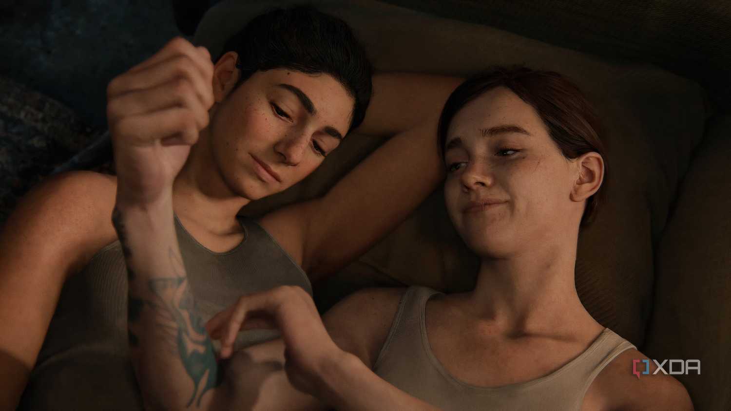 A screenshot from the game The Last of Us Part II Remastered on PC, showing Dina and Ellie together.