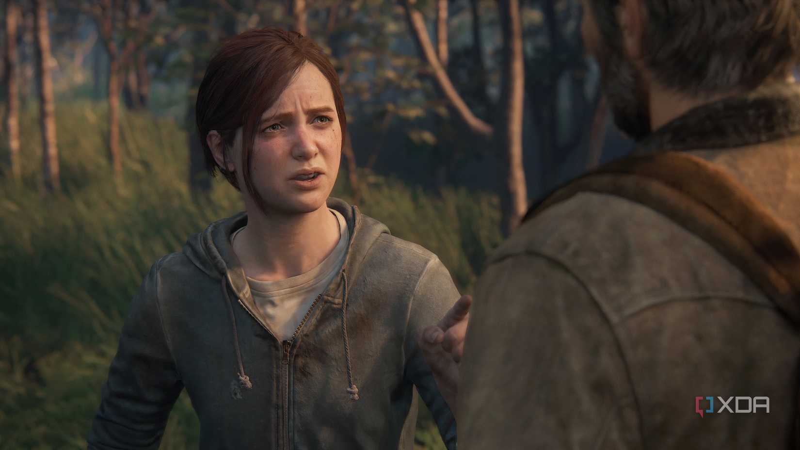 A screenshot from the game The Last of Us Part II Remastered on PC, showing an emotional conversation between Ellie and Joel.