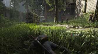 A screenshot from the game The Last of Us Part II Remastered on PC, showing Ellie crawling through grass as zombies stand around her.