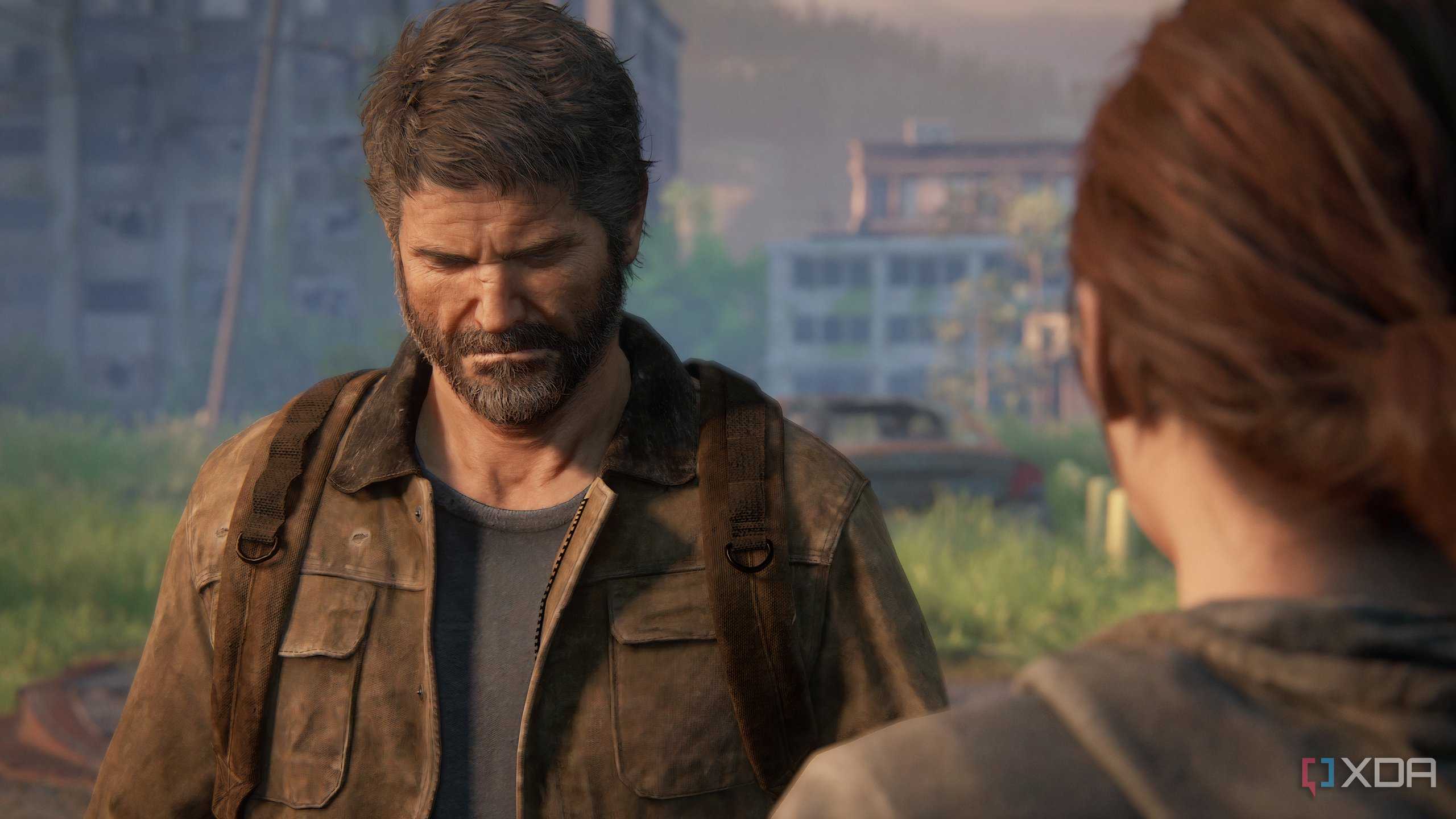 A screenshot from the game The Last of Us Part II Remastered on PC, showing Joel grimacing.