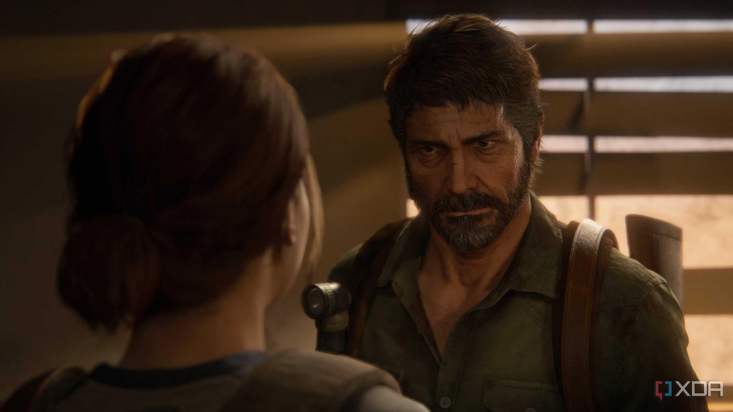 A screenshot from the game The Last of Us Part II Remastered on PC, showing Joel talking sternly to Ellie.