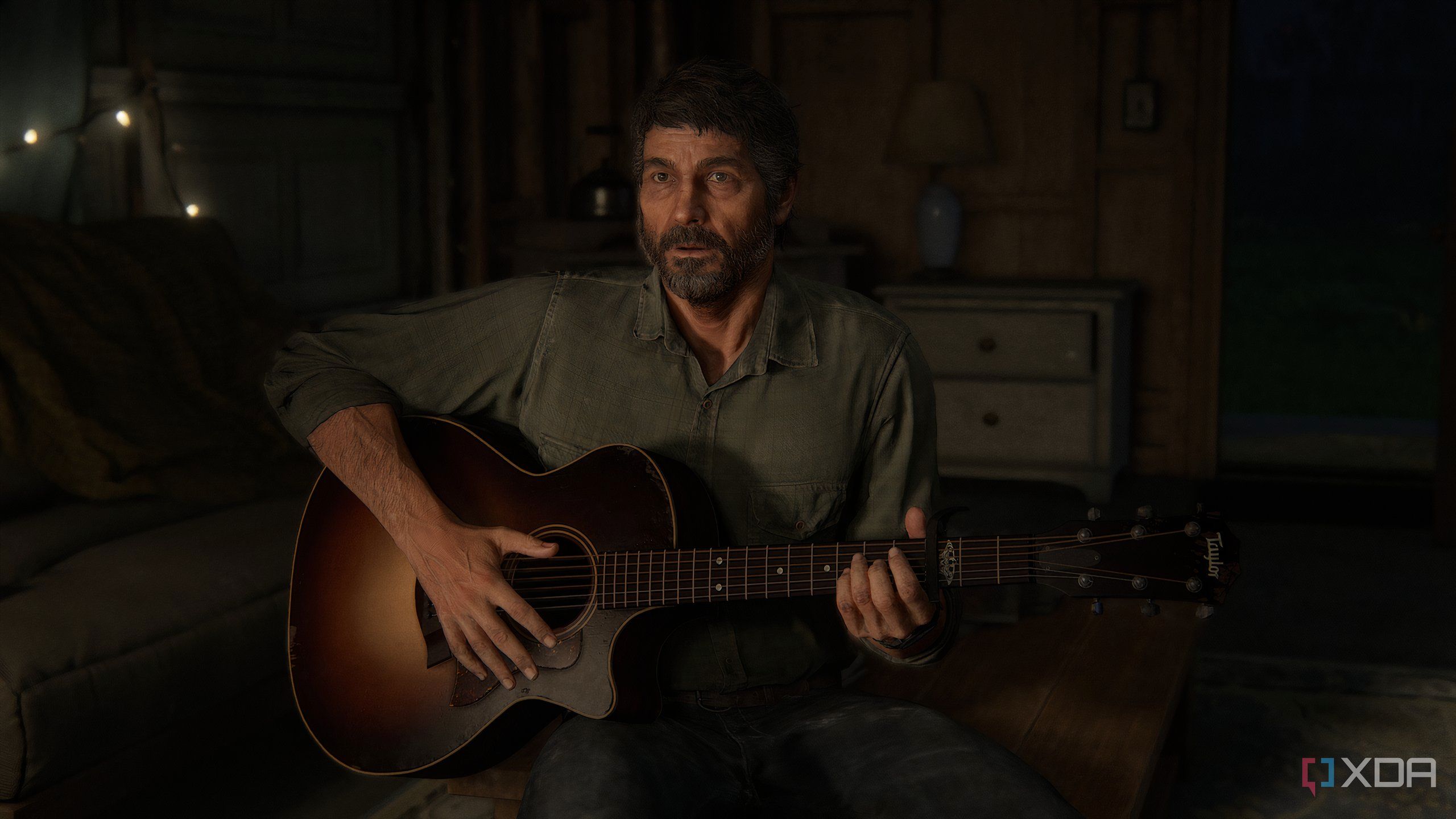 A screenshot from the game The Last of Us Part II Remastered on PC, showing Joel holding a guitar.