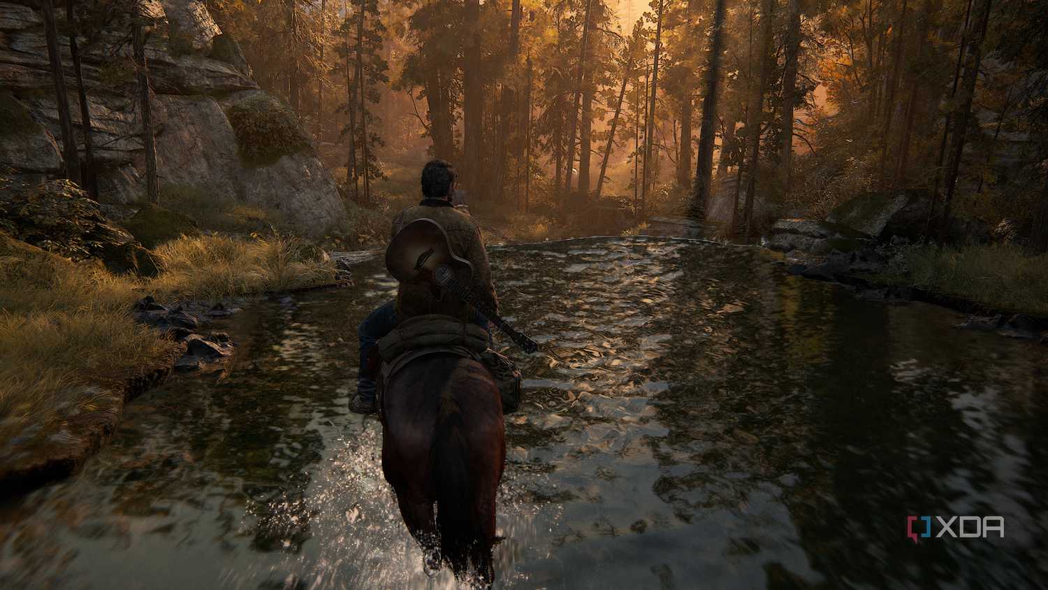 A screenshot from the game The Last of Us Part II Remastered on PC, showing Joel on horseback, wading through water.