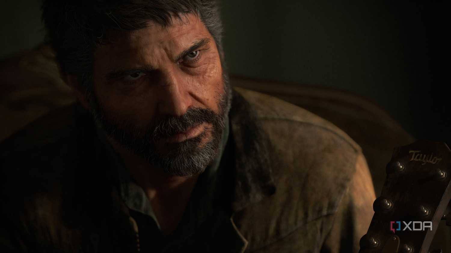 A screenshot from the game The Last of Us Part II Remastered on PC, showing Joel looking serious.
