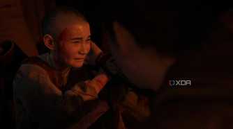 A screenshot from the game The Last of Us Part II Remastered on PC, showing a young Lev crying.