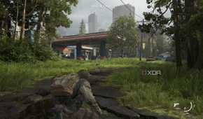 A screenshot from the game The Last of Us Part II Remastered on PC, showing Bill crouching on a broken road, with a gas station nearby.