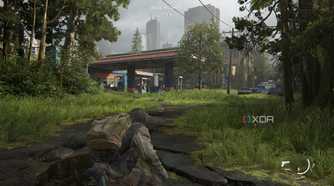 A screenshot from the game The Last of Us Part II Remastered on PC, showing Bill crouching on a broken road, with a gas station nearby.