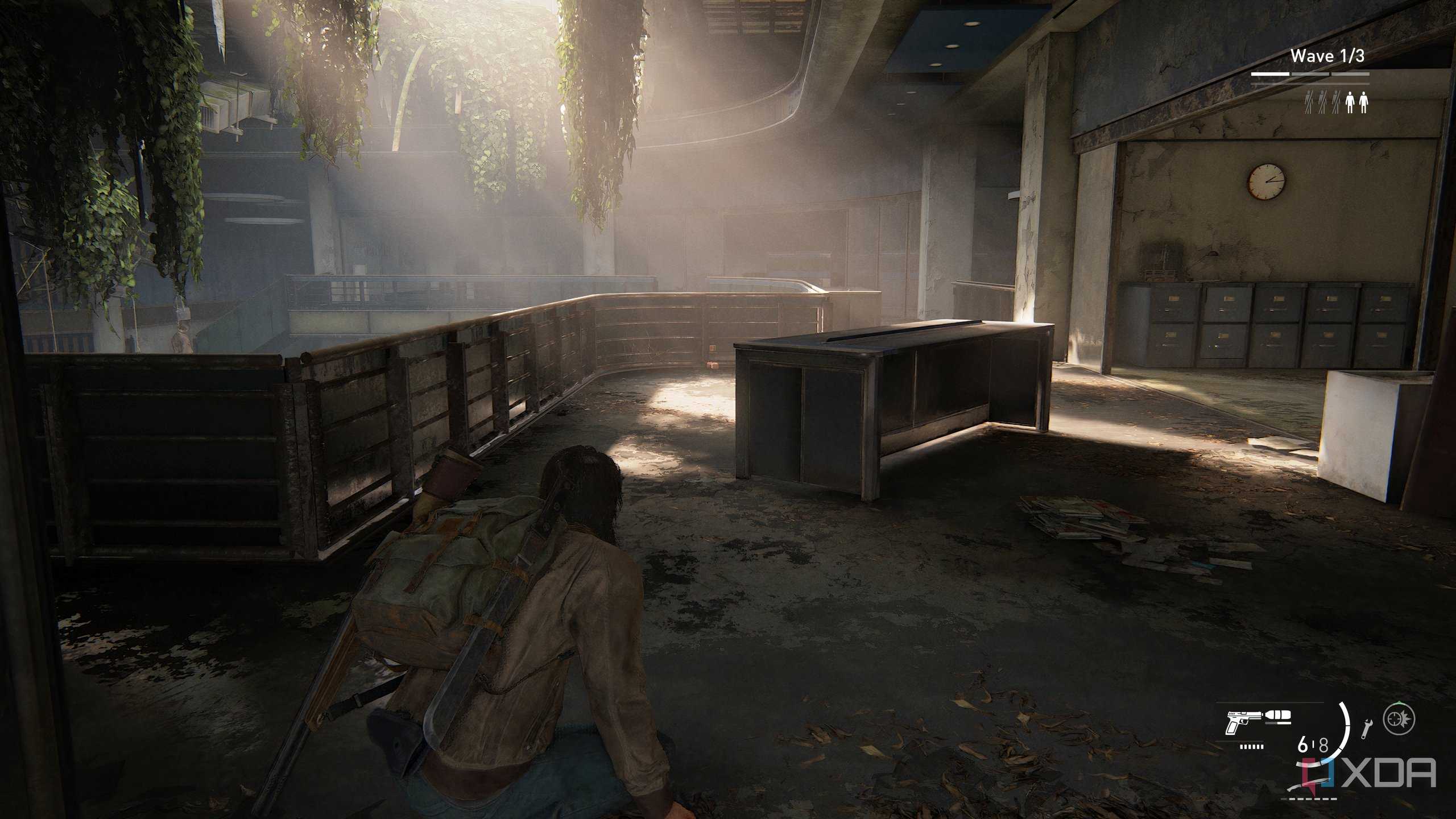 A screenshot from the game The Last of Us Part II Remastered on PC, showing Jesse crouching inside an office as sunlight peers through.