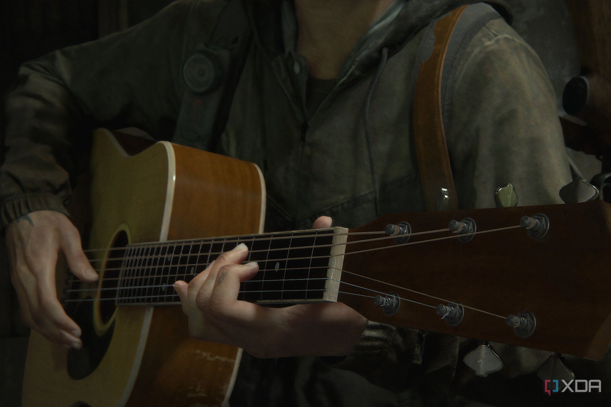 A screenshot from The Last of Us Part II, showing Ellie holding a guitar.