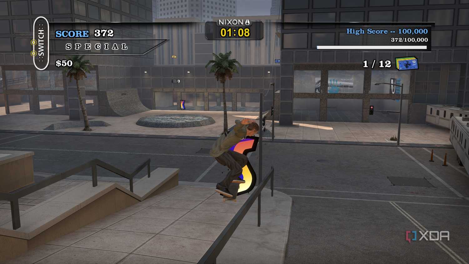 A screenshot from the 2012 game "Tony Hawk's Pro Skater HD", showing Tony Hawk grinding on a rail in the game's Los Angeles map.
