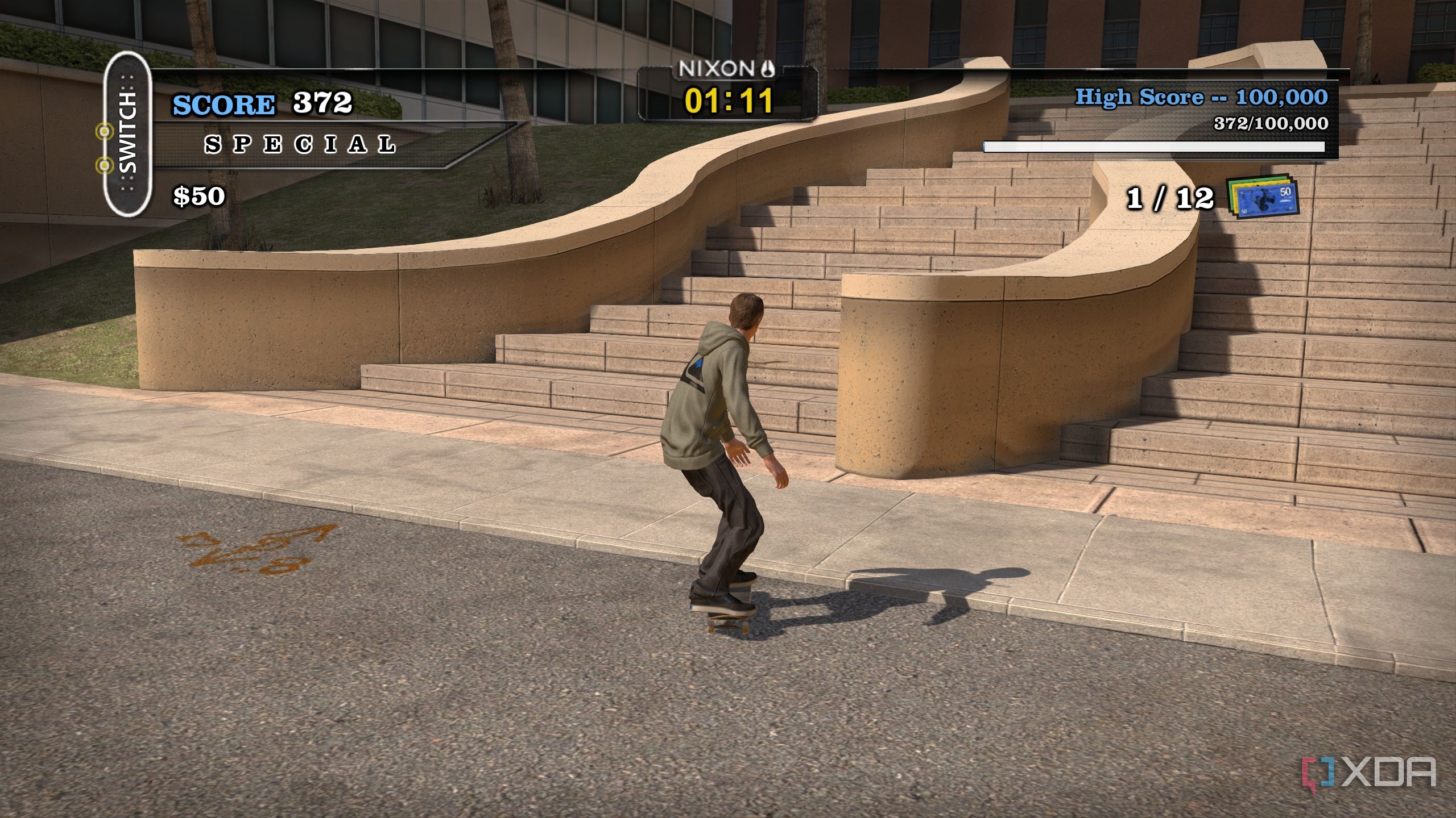 A screenshot from the 2012 game "Tony Hawk's Pro Skater HD", showing Tony Hawk skating next to some stairs in the Los Angeles map.