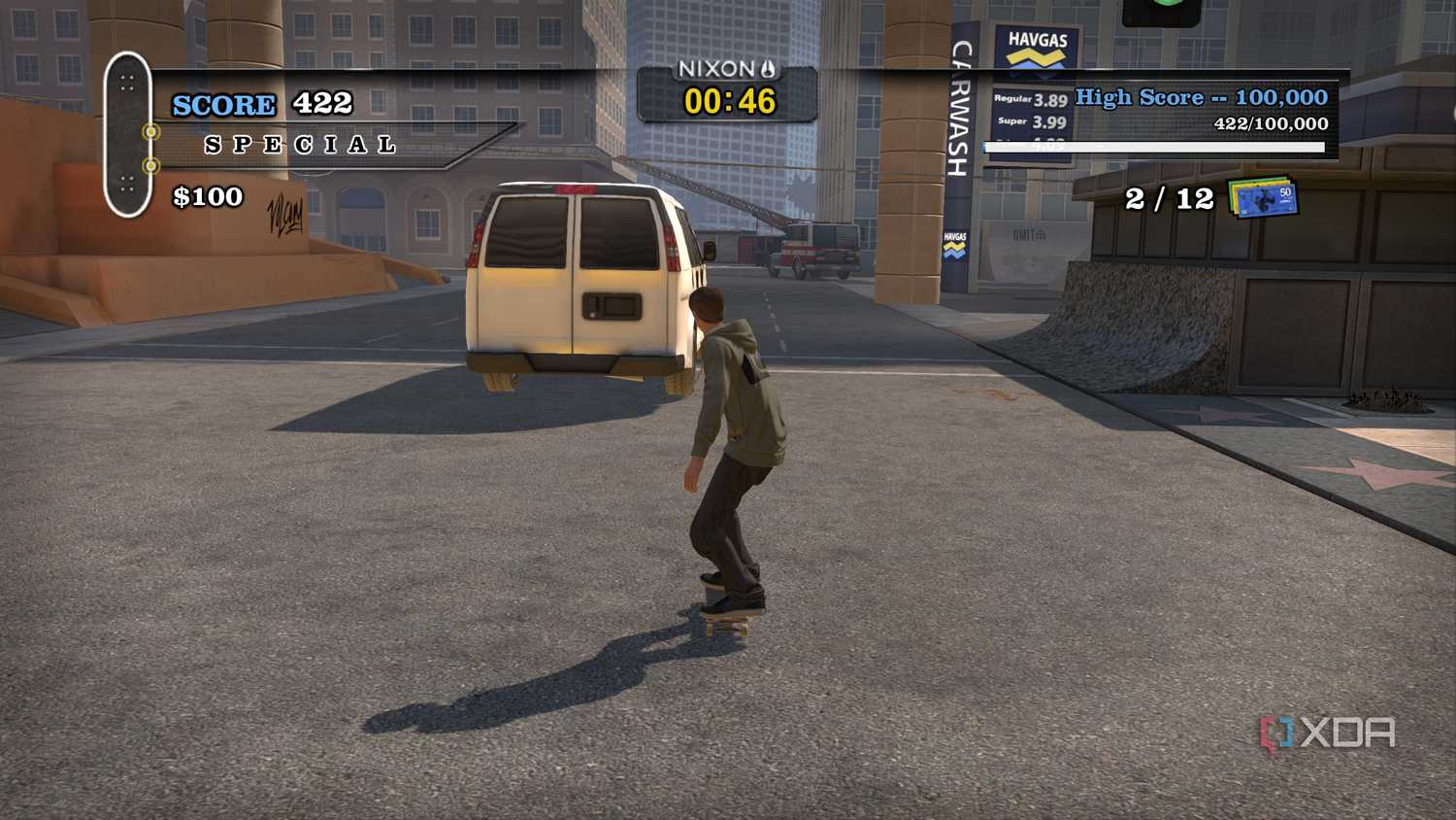 A screenshot from the 2012 game "Tony Hawk's Pro Skater HD", showing Tony Hawk skating after a white van in the game's Los Angeles map.