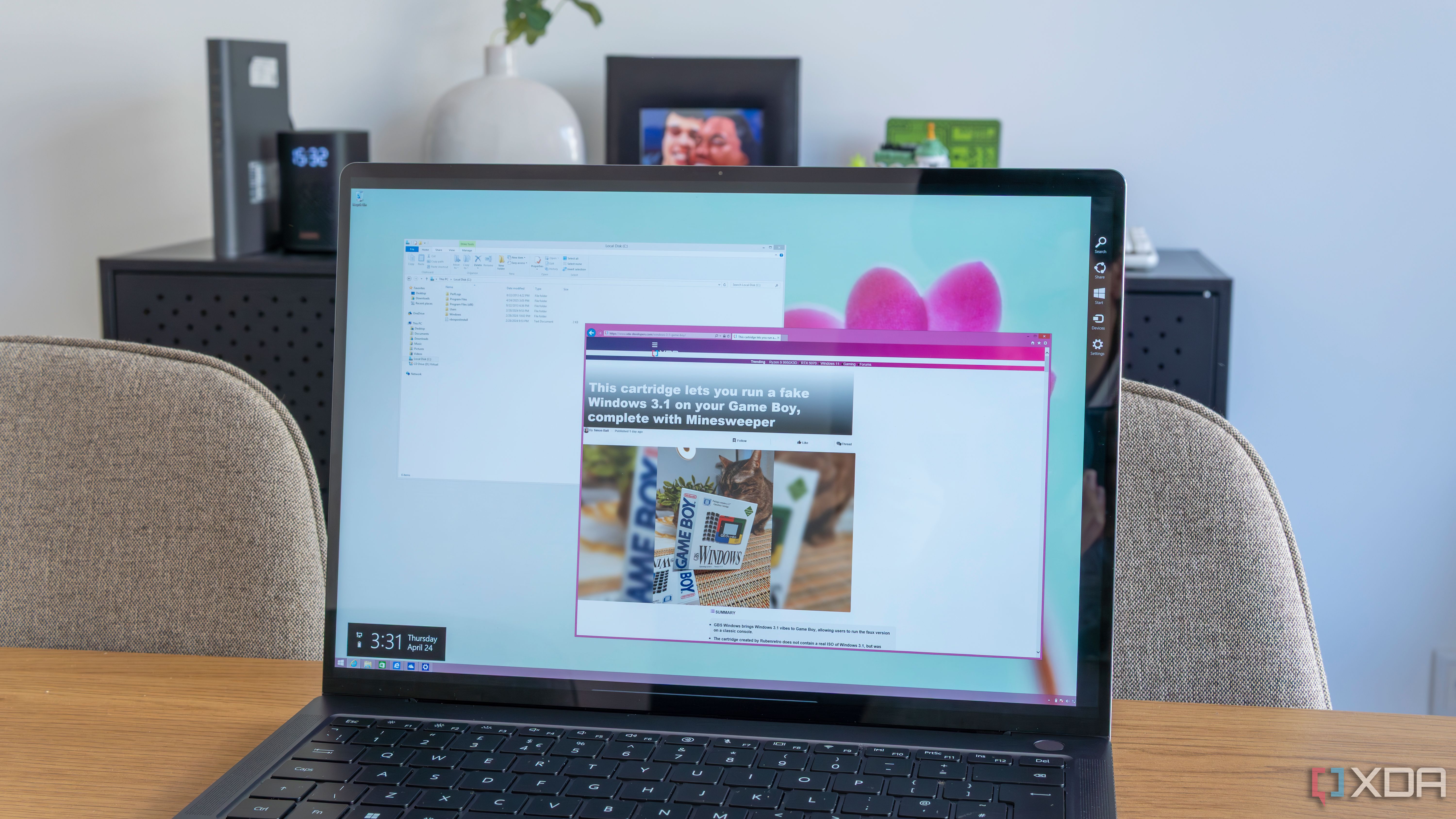 A laptop with Windows 8.1 showing the File Explorer, Internet Explorer 11, and the Charms bar