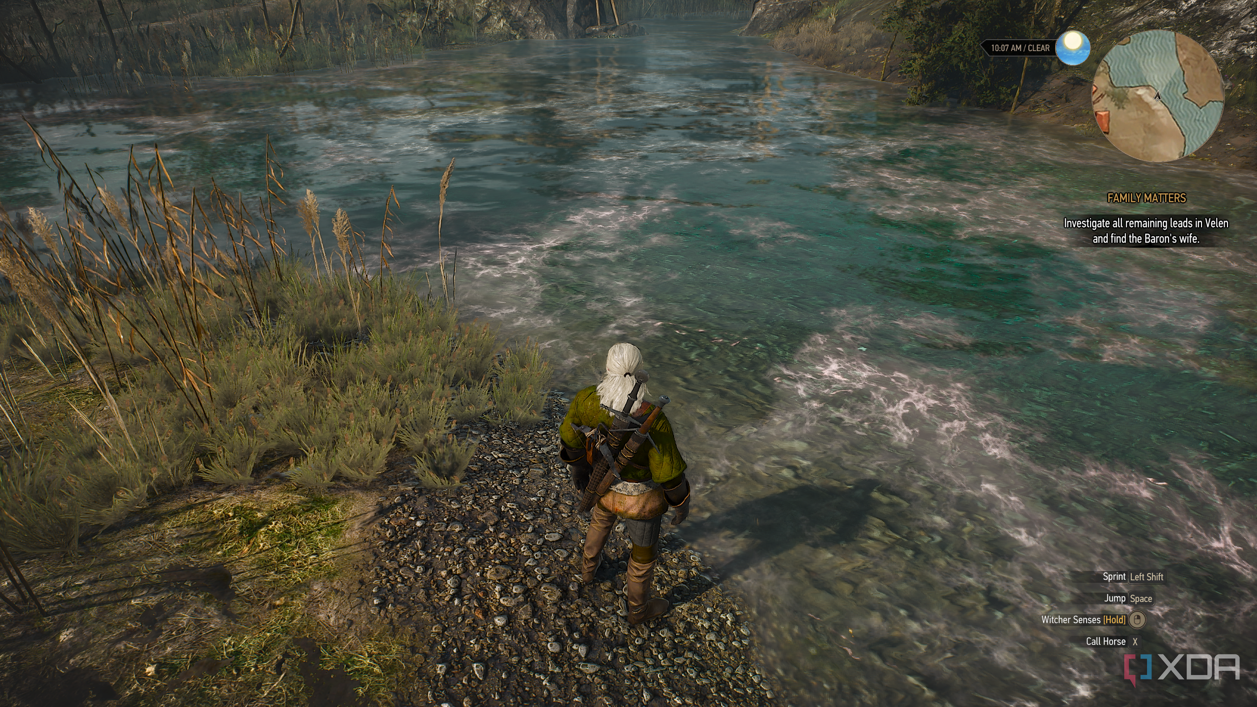 The Witcher 3's RT update running on an RTX 3060 Ti, showing Geralt standing near water