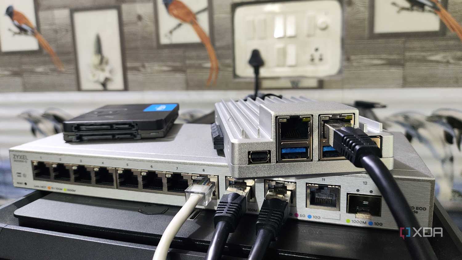 The ZimaBoard 2 resting on a switch