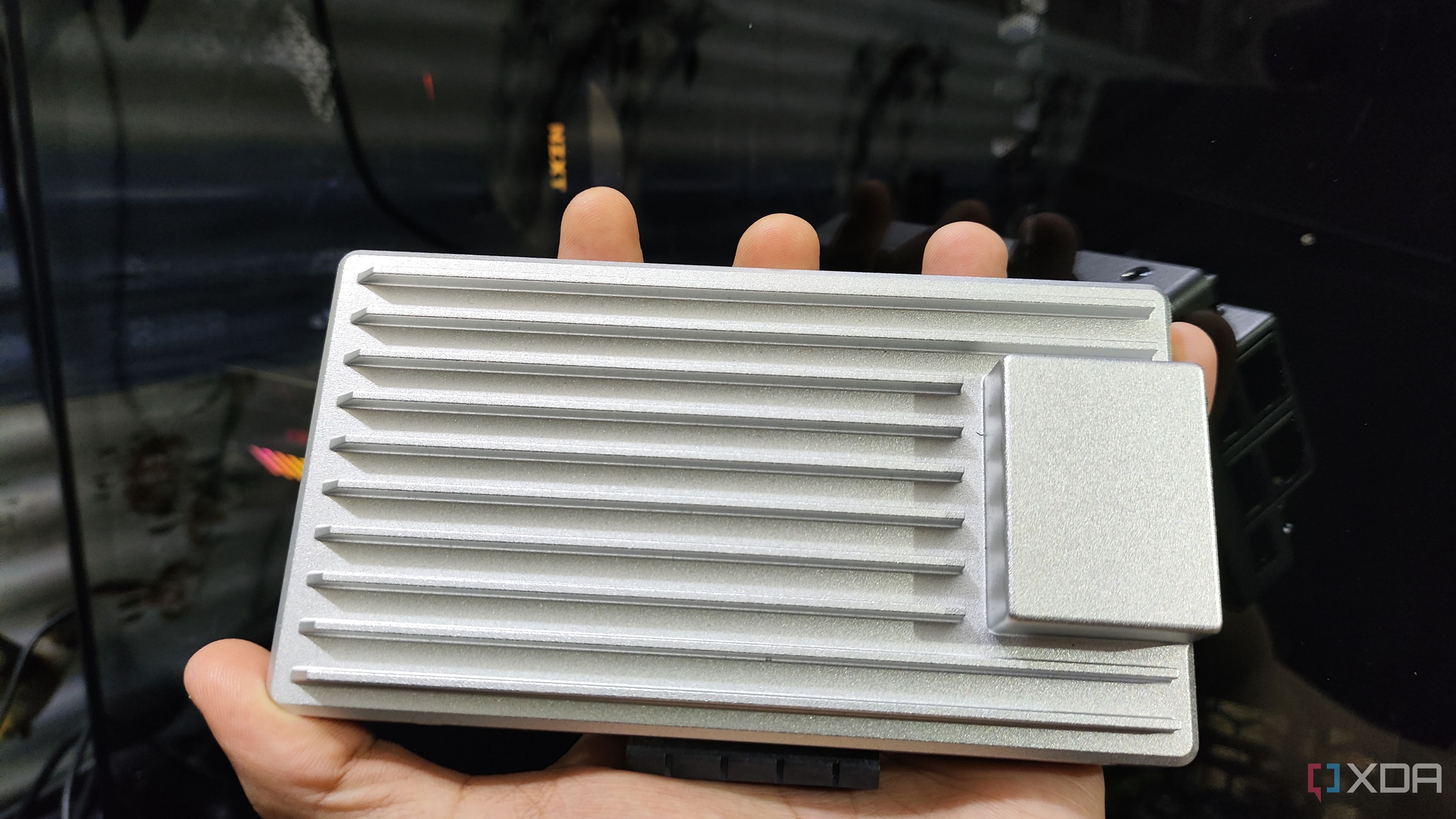 A person holding a ZimaBoard 2