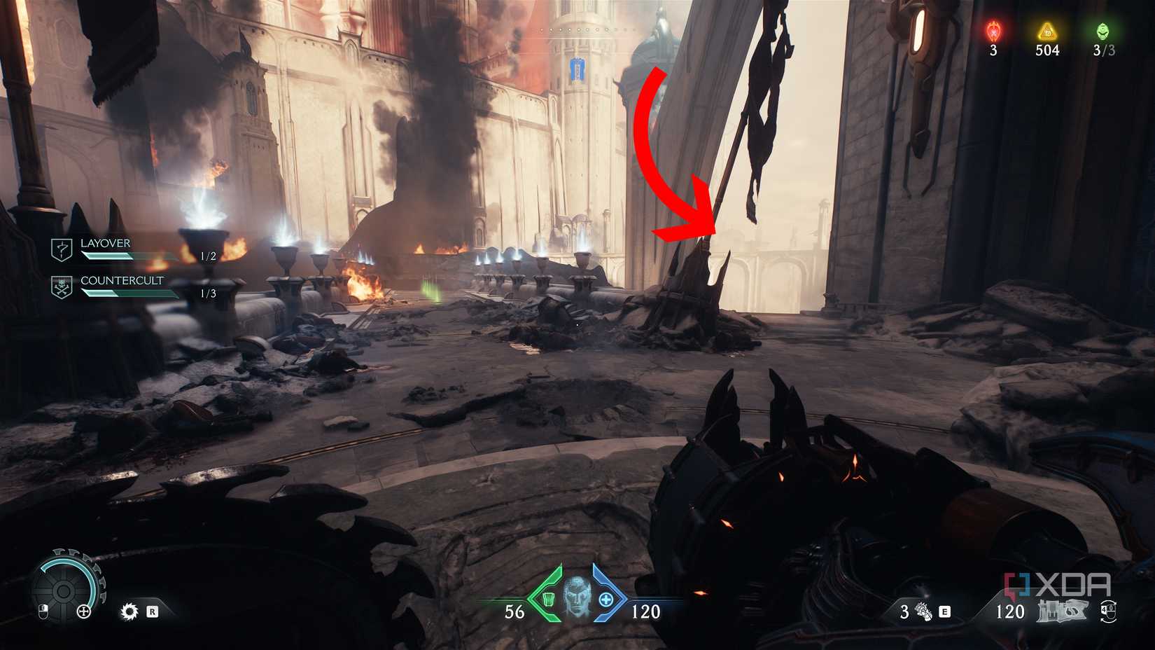 An arrow pointing towards the right side of a bridge in Doom: The Dark Ages.