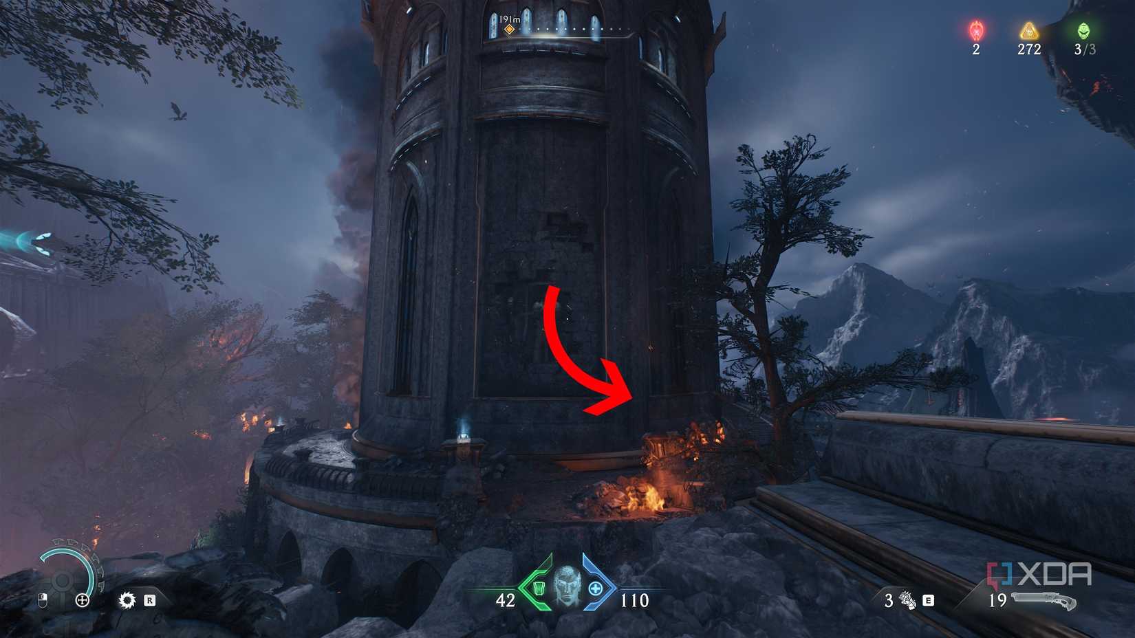 An arrow pointing to the right of a tower in Doom: The Dark Ages.