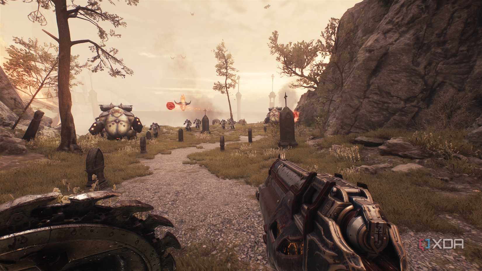 A large field with two Mancubii in Doom: The Dark Ages.
