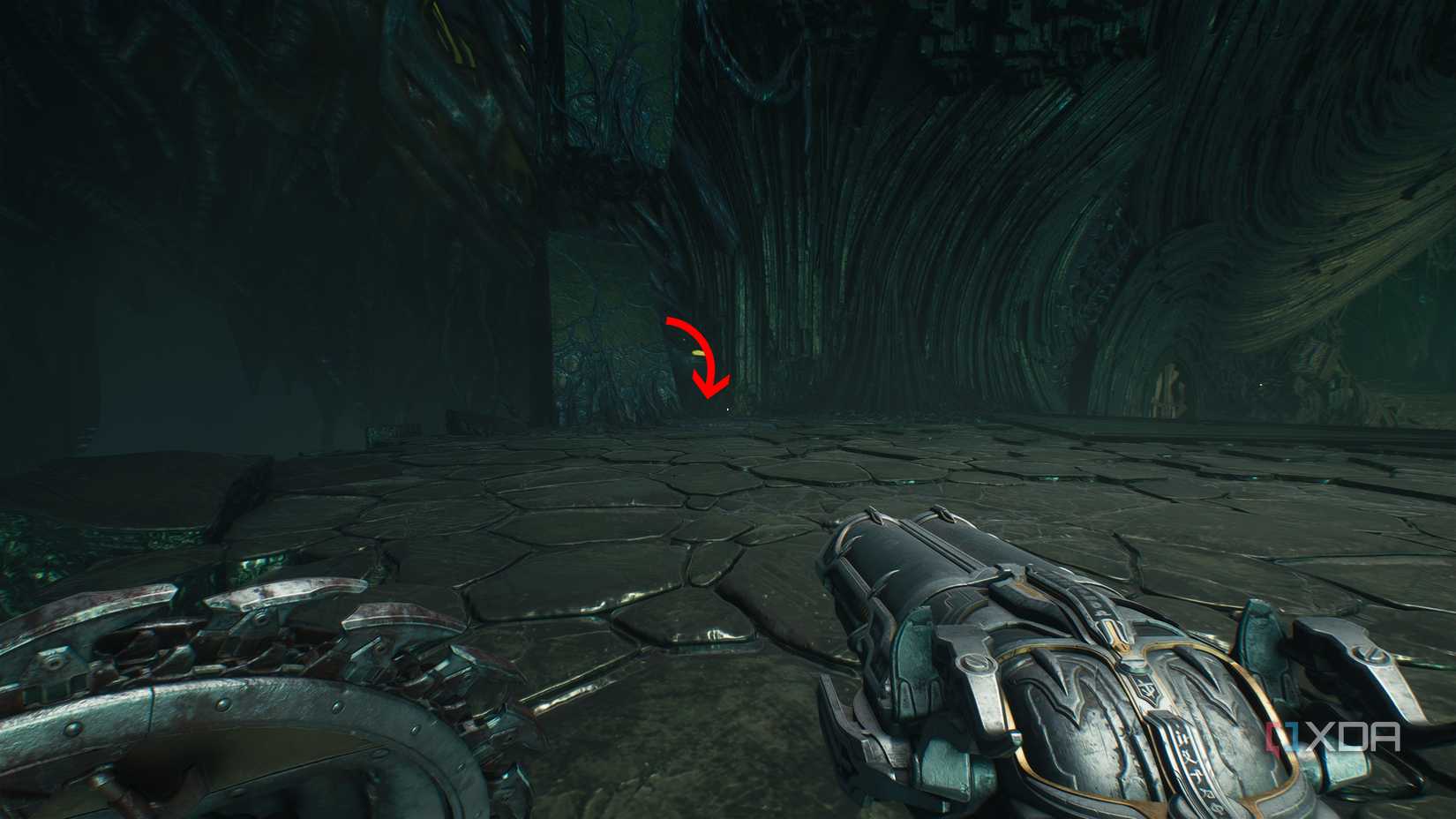 An arrow pointing down to secret area 5 in chapter 15 of Doom: The Dark Ages.