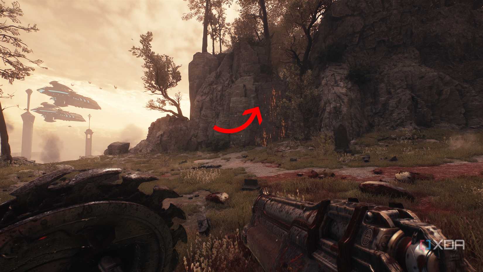 An arrow pointing to a scramble wall in Doom: The Dark Ages.