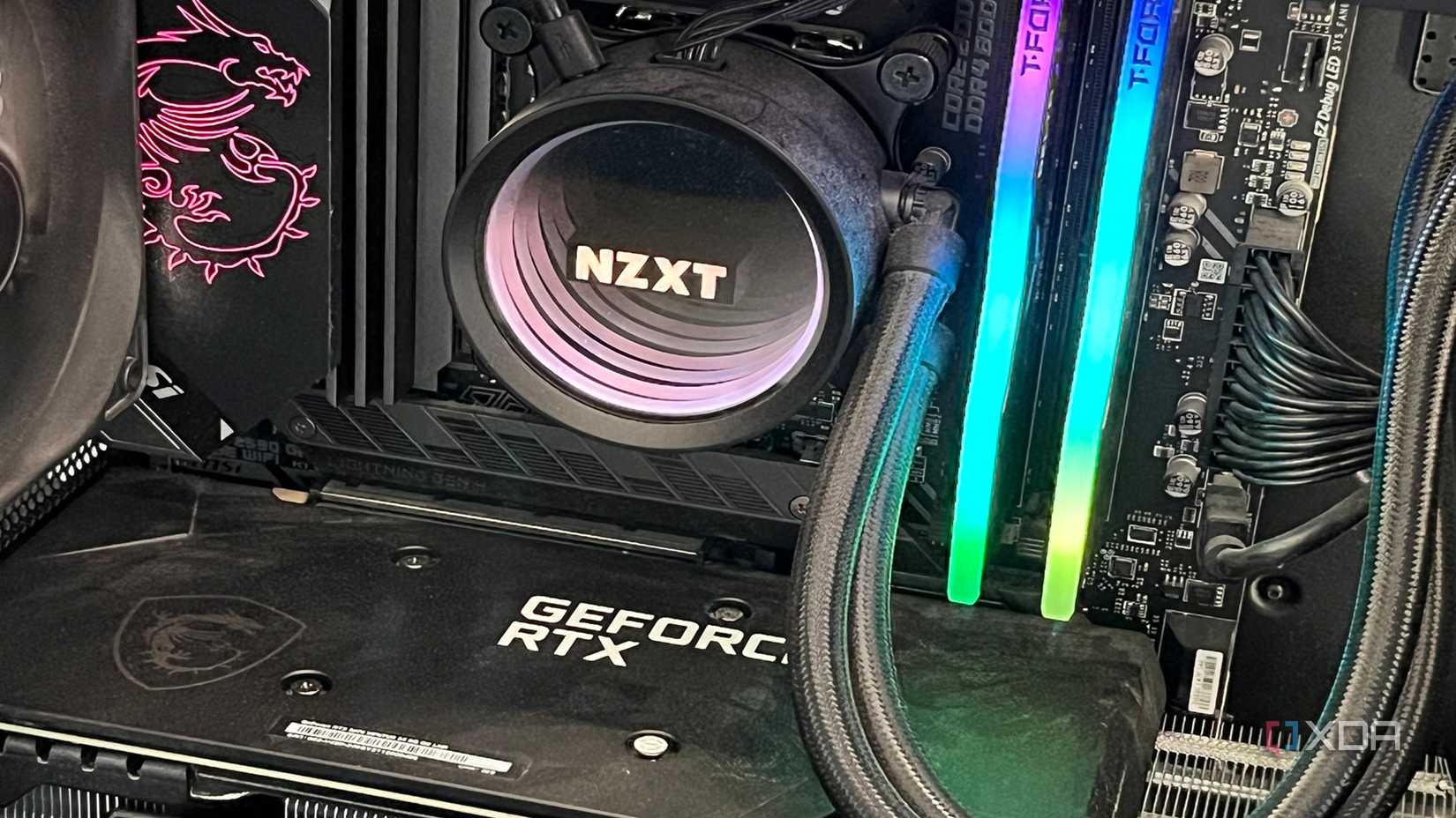 A picture of the inside of a PC setup with the NZXT logo on it.