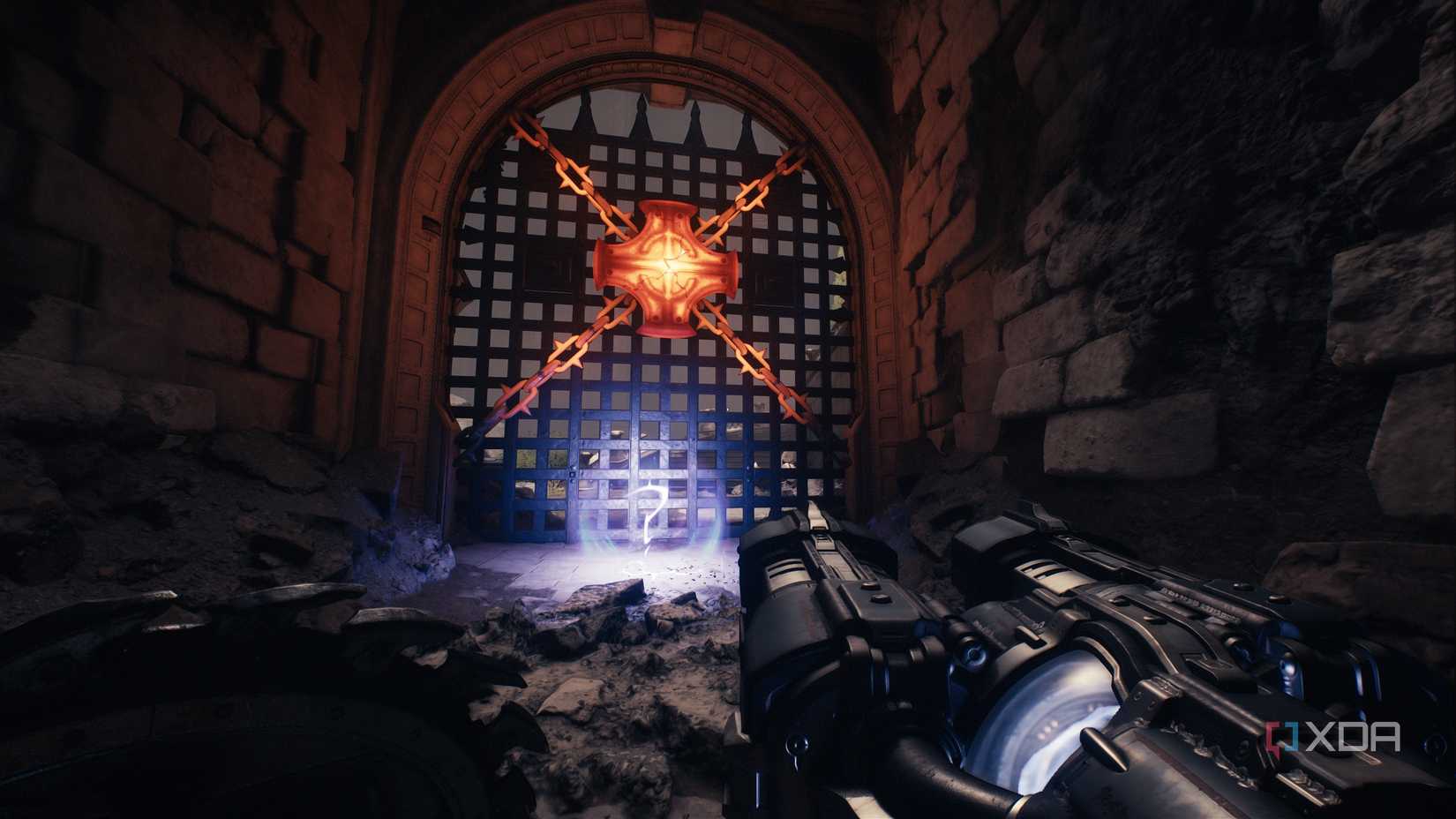A secret collectible toy and a heated metal cross barricading a gate in Doom: The Dark Ages.