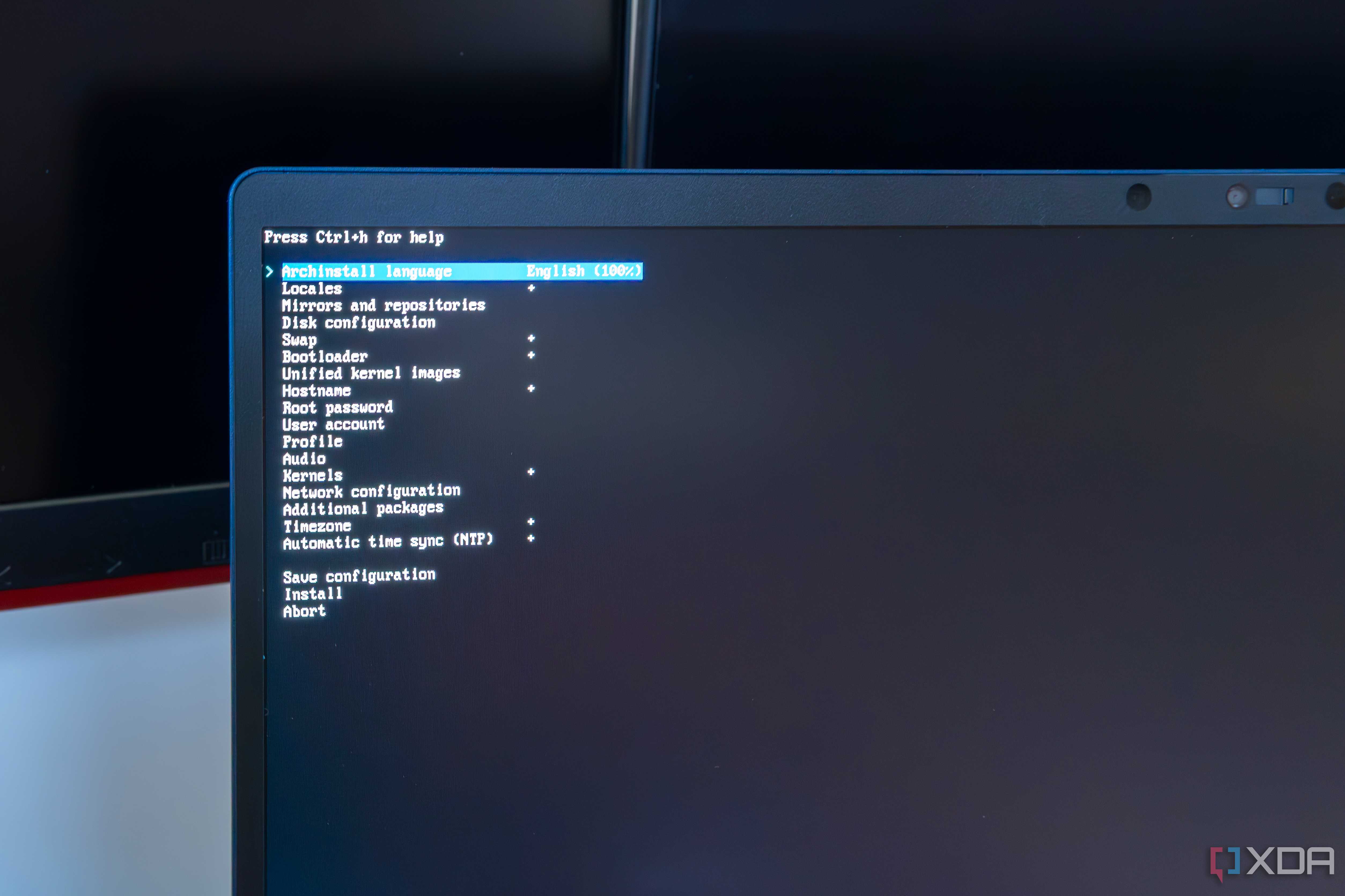 Close-up of a laptop showing the available options during the Arch Linux setup