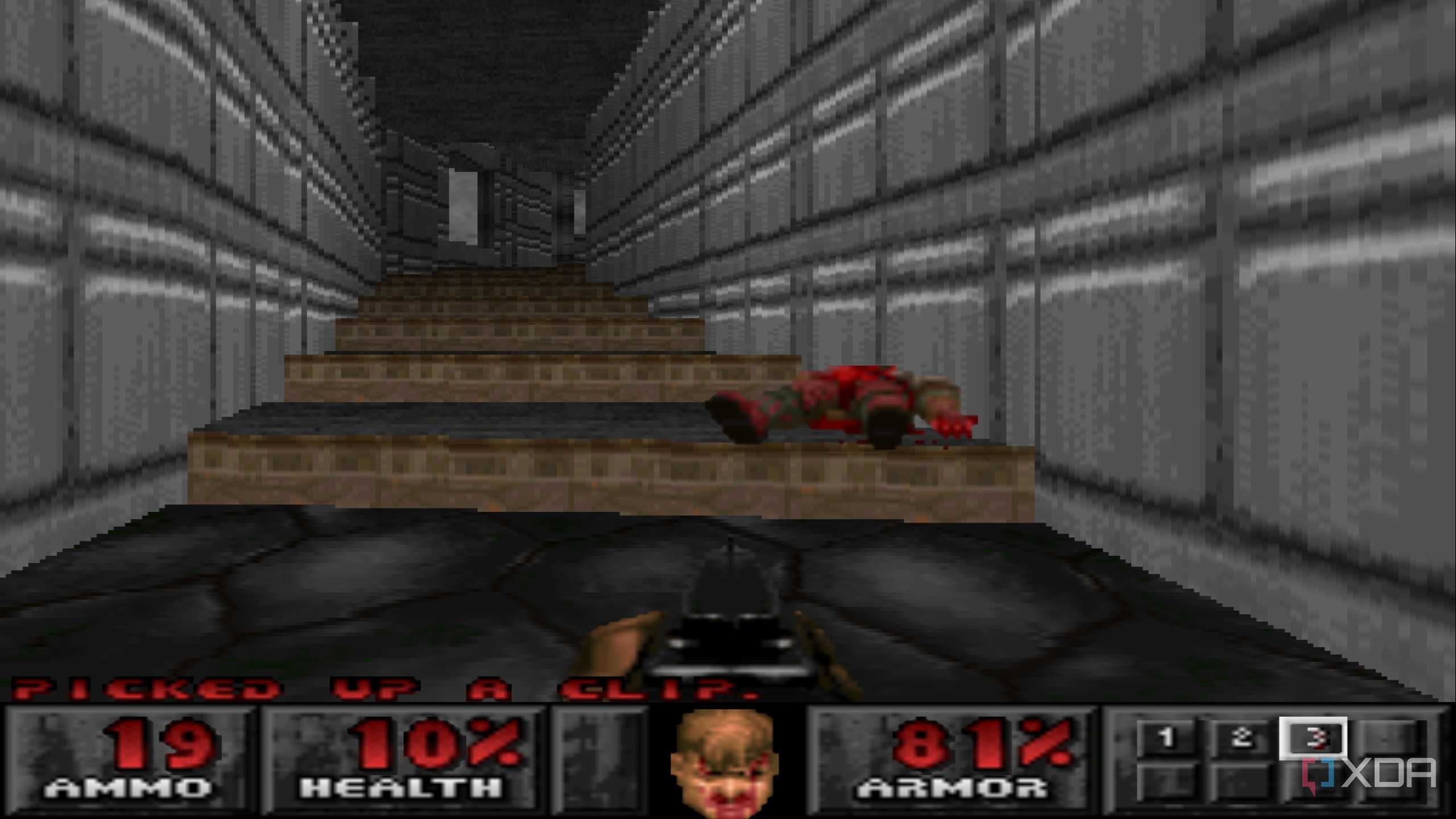 The Doom Marine using a shotgun on a demon in PlayStation 1 game Doom.
