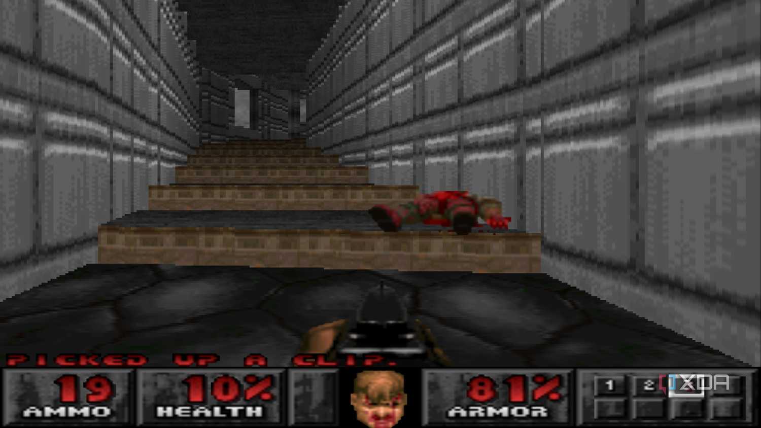 The Doom Marine using a shotgun on a demon in PlayStation 1 game Doom.