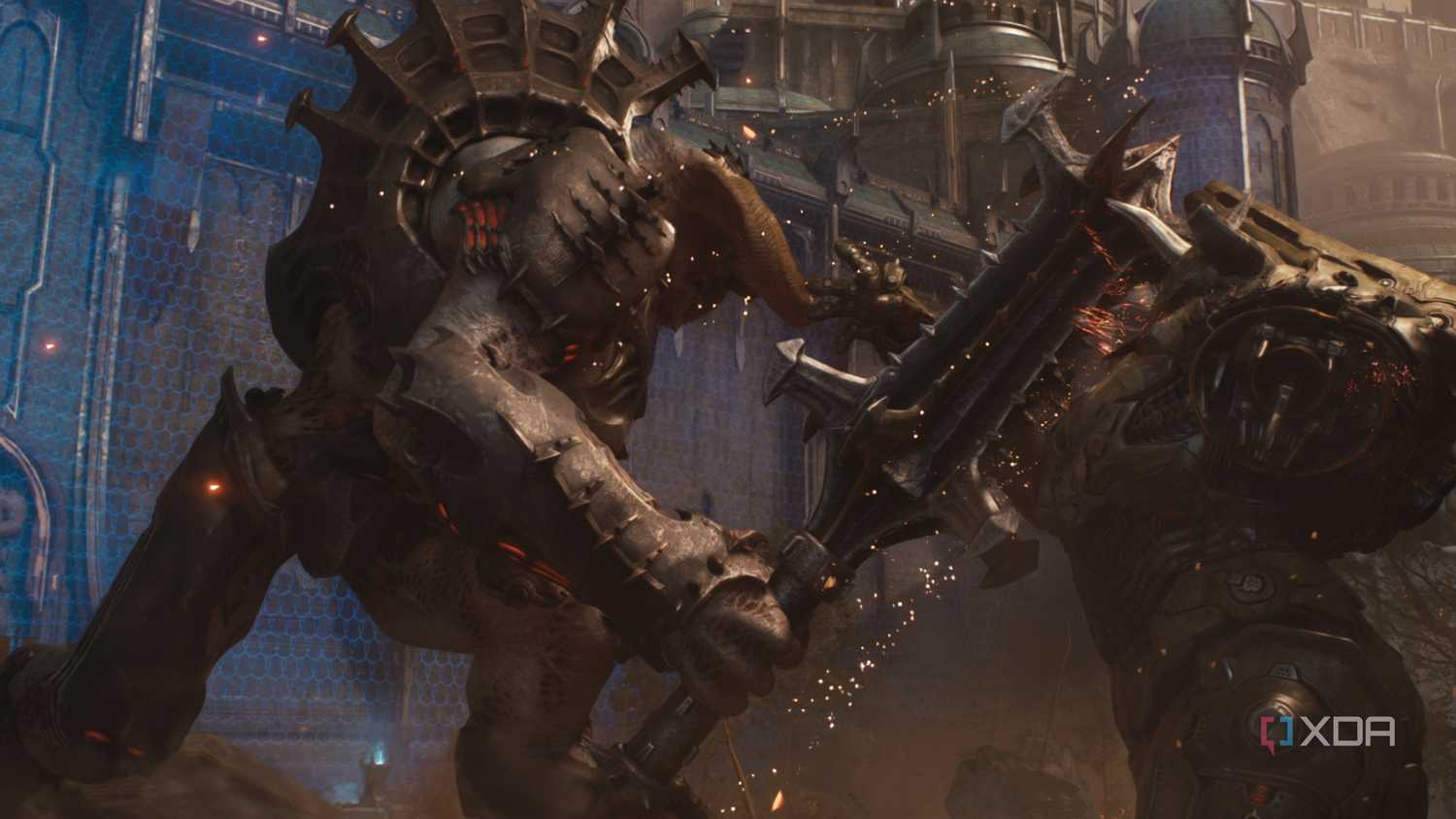 A humongous demon titan and Atlan Mech fighting in Doom: The Dark Ages.