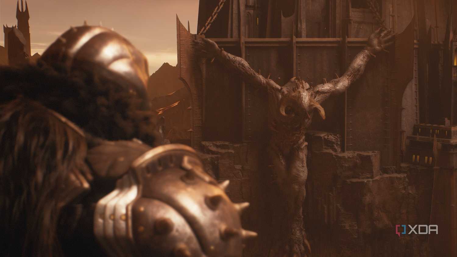 The Doom Slayer looking at a huge crucified Titan.