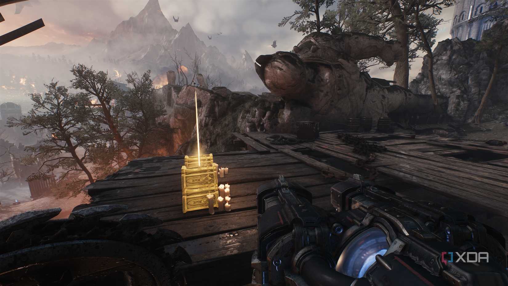 Gold stacks lying beside a fallen King Novik statue in Doom: The Dark Ages.