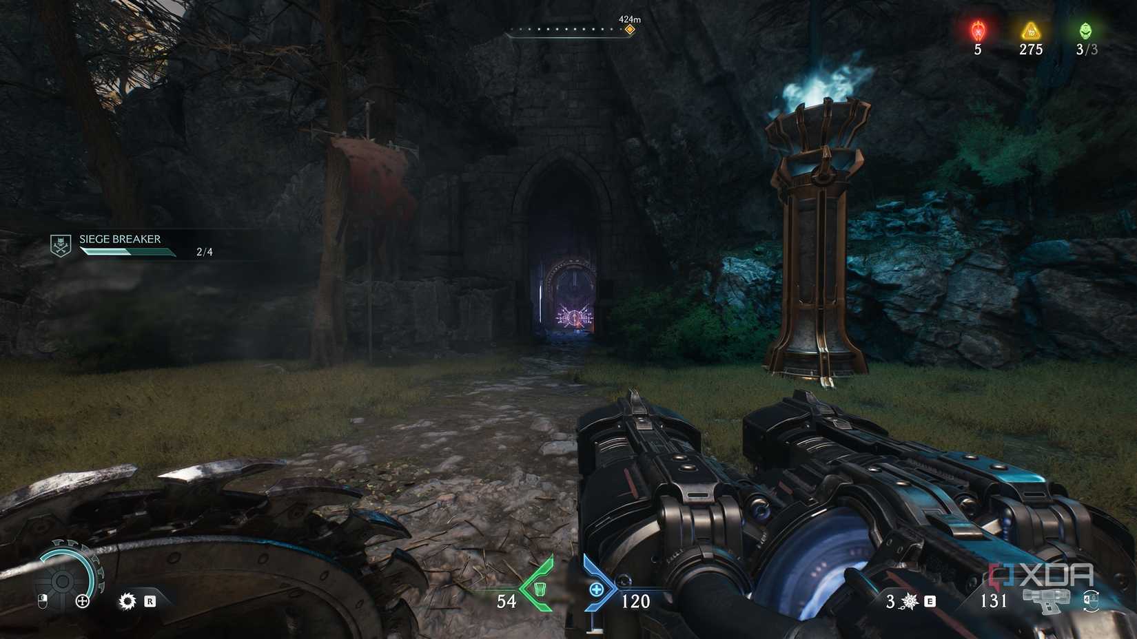 A cave entrance with a blue-flame torch pillar and a purple-coded locked gate in Doom: The Dark Ages.