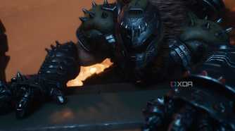 The Doom Slayer climbing a ledge in Doom: The Dark Ages.