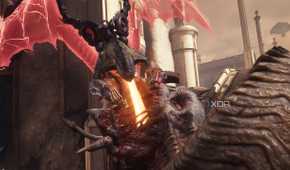 A dragon mount breathing fire down a titan's throat in Doom: The Dark Ages.