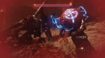 The Doom Slayer holding the heart of a cyberdemon in his hand in Doom: The Dark Ages.