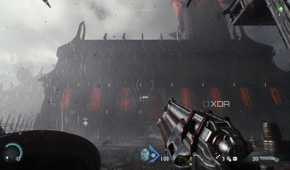A rain-soaked medieval building in Doom: The Dark Ages.
