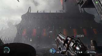 A rain-soaked medieval building in Doom: The Dark Ages.