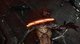 The Doom Slayer beheading a demon with the Shield Saw in Doom: The Dark Ages.