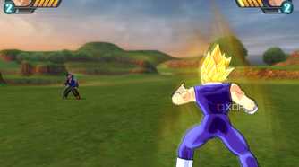 Vegeta fighting Trunks in a grassy field in Dragon Ball Z: Budokai Tenkaichi 3.