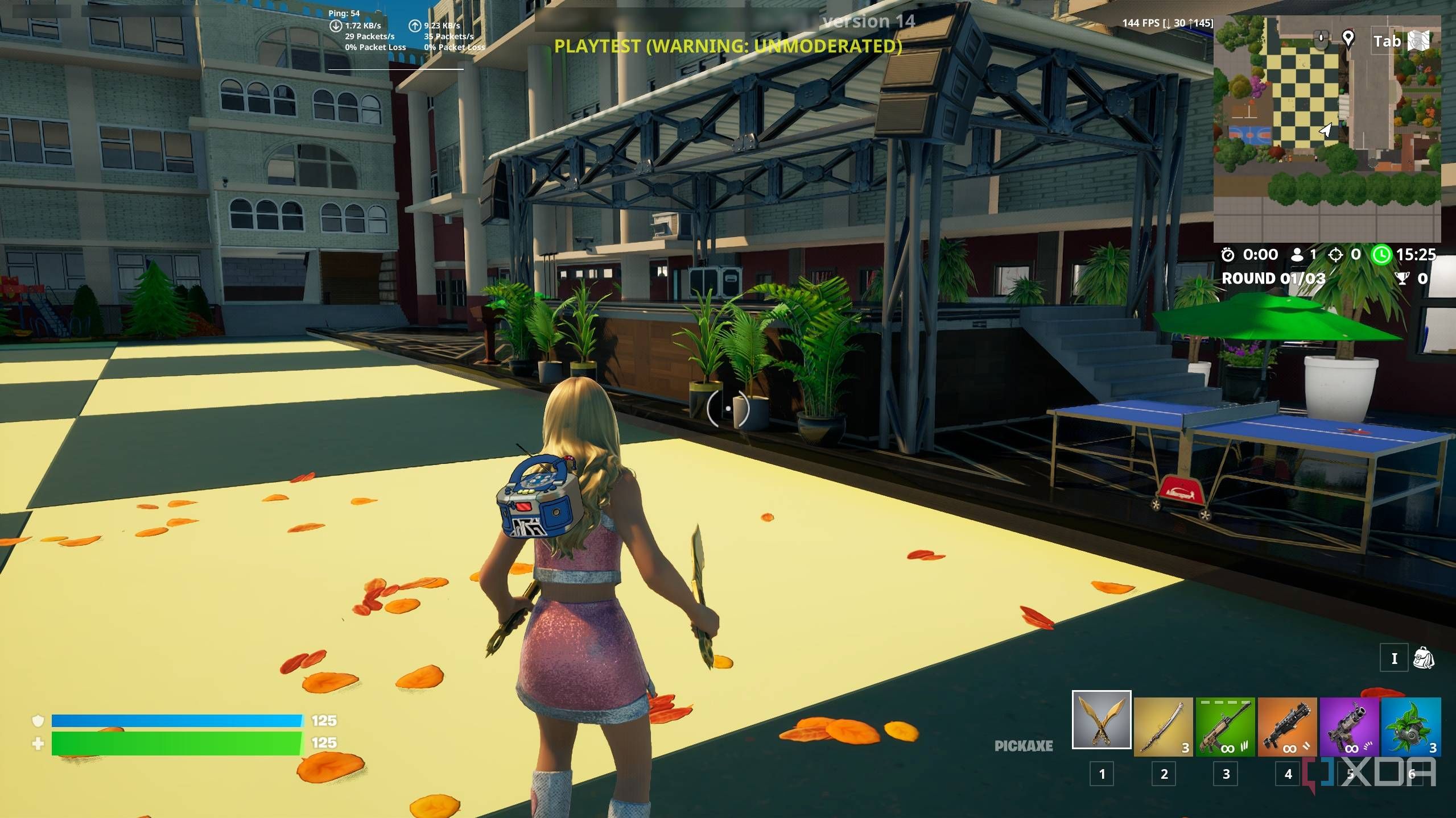 A high school in Fortnite with a stage and a ping-pong table.
