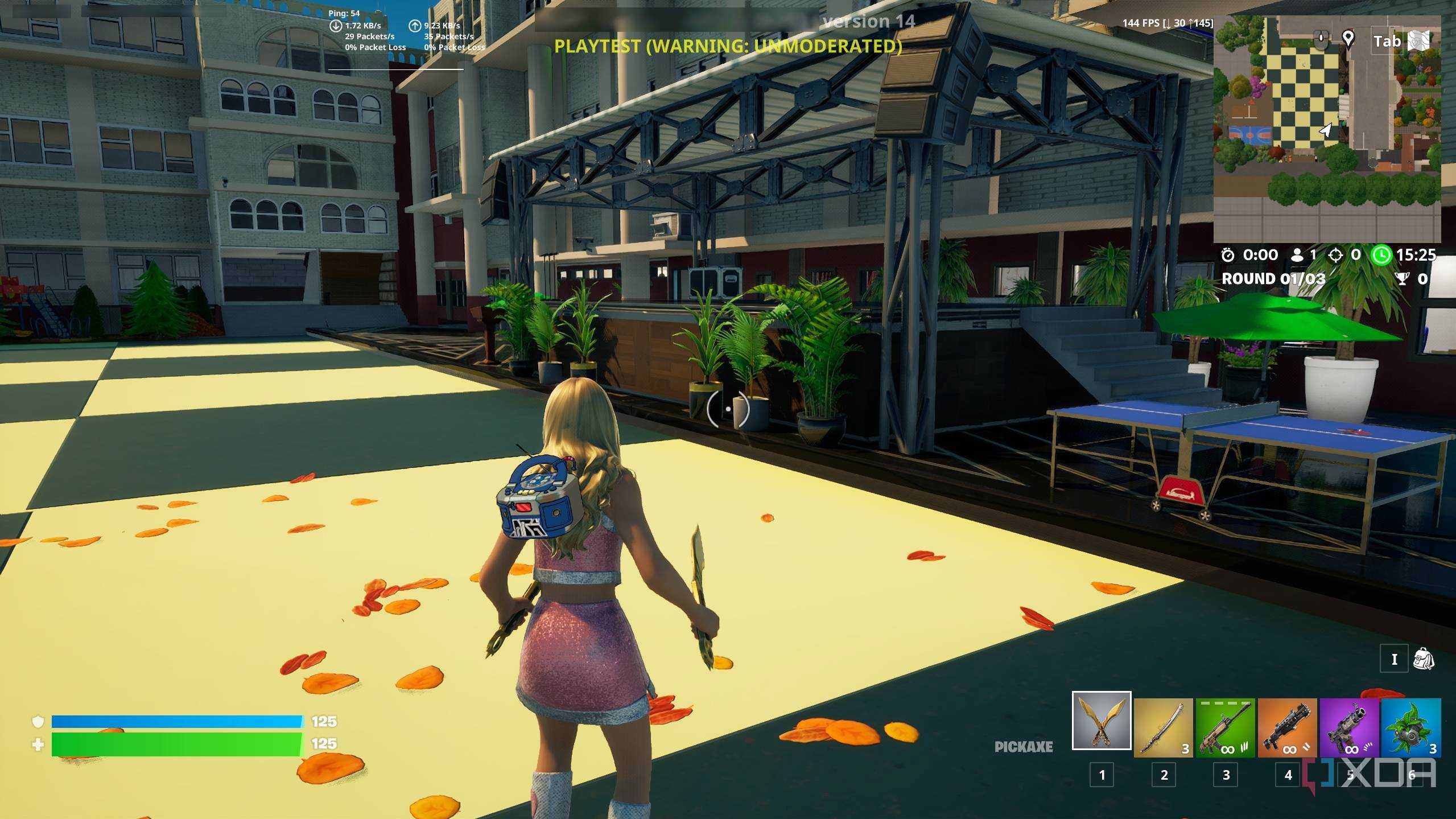 A high school in Fortnite with a stage and a ping-pong table.