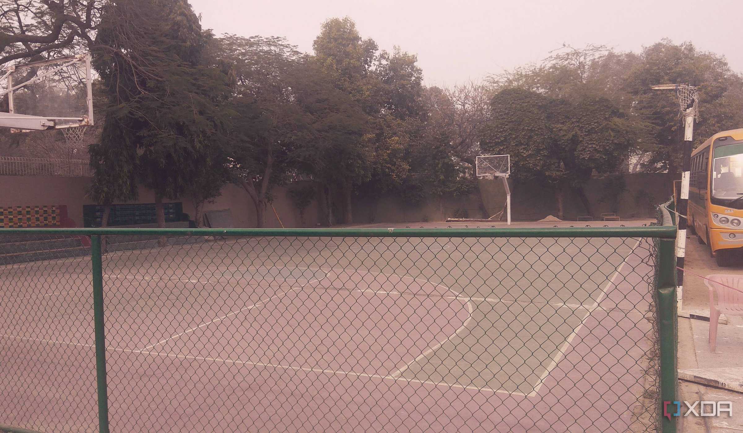 A photograph of a high-school basketball court.