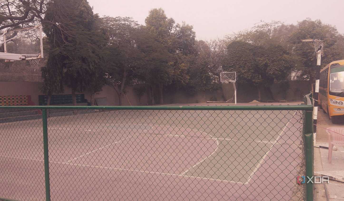 A photograph of a high-school basketball court.