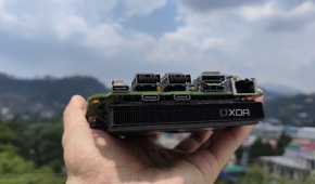 A person holding an Intel N100 mini-PC
