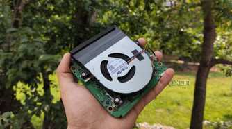 A person holding an Intel N100 system